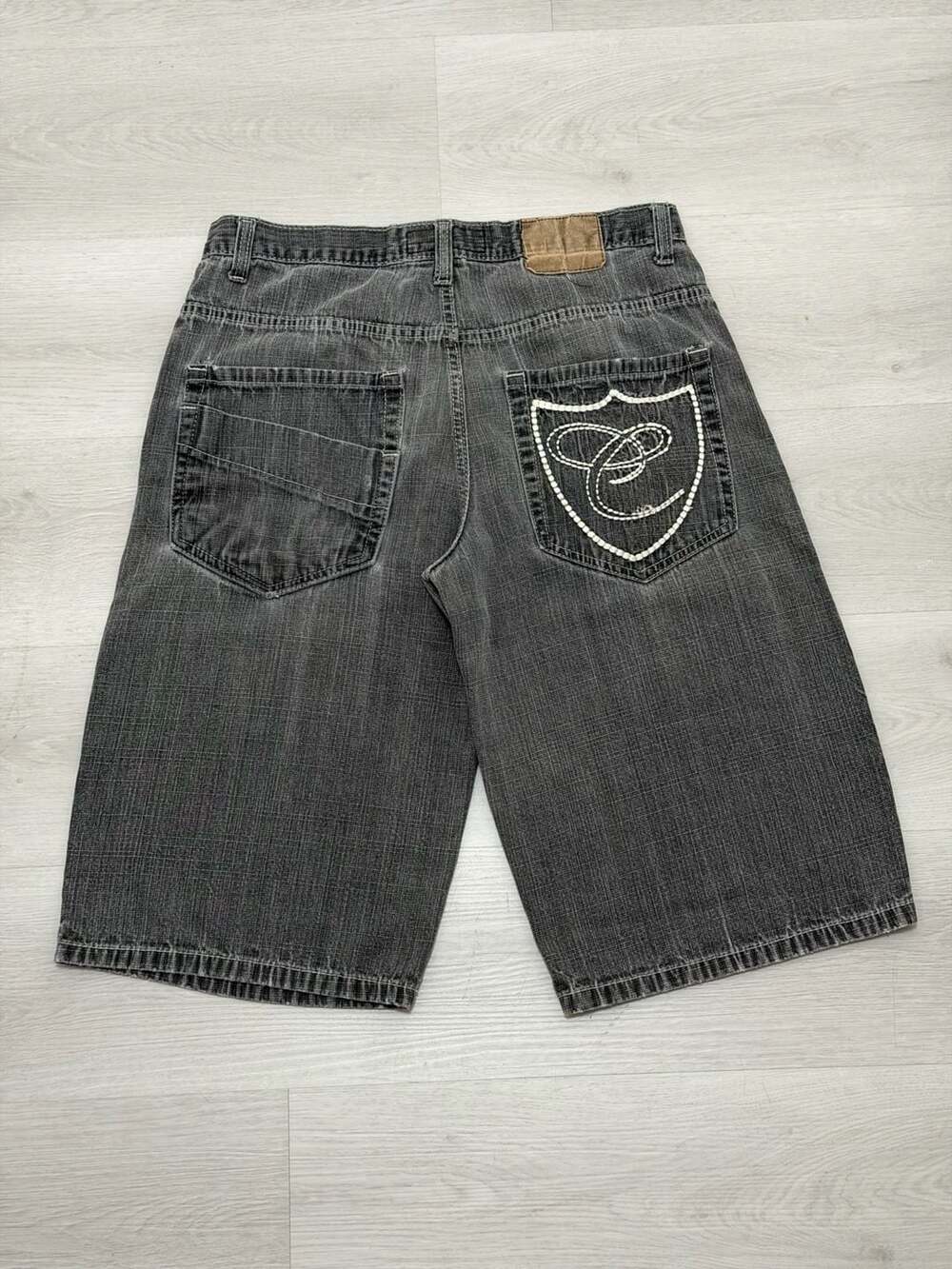 Vintage Corked Jeans Y2K Baggy Black Denim Jorts with Shield Embroidery Size 34